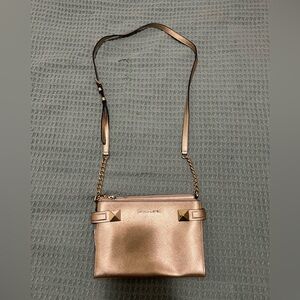 Michael Kors gold metallic crossbody.